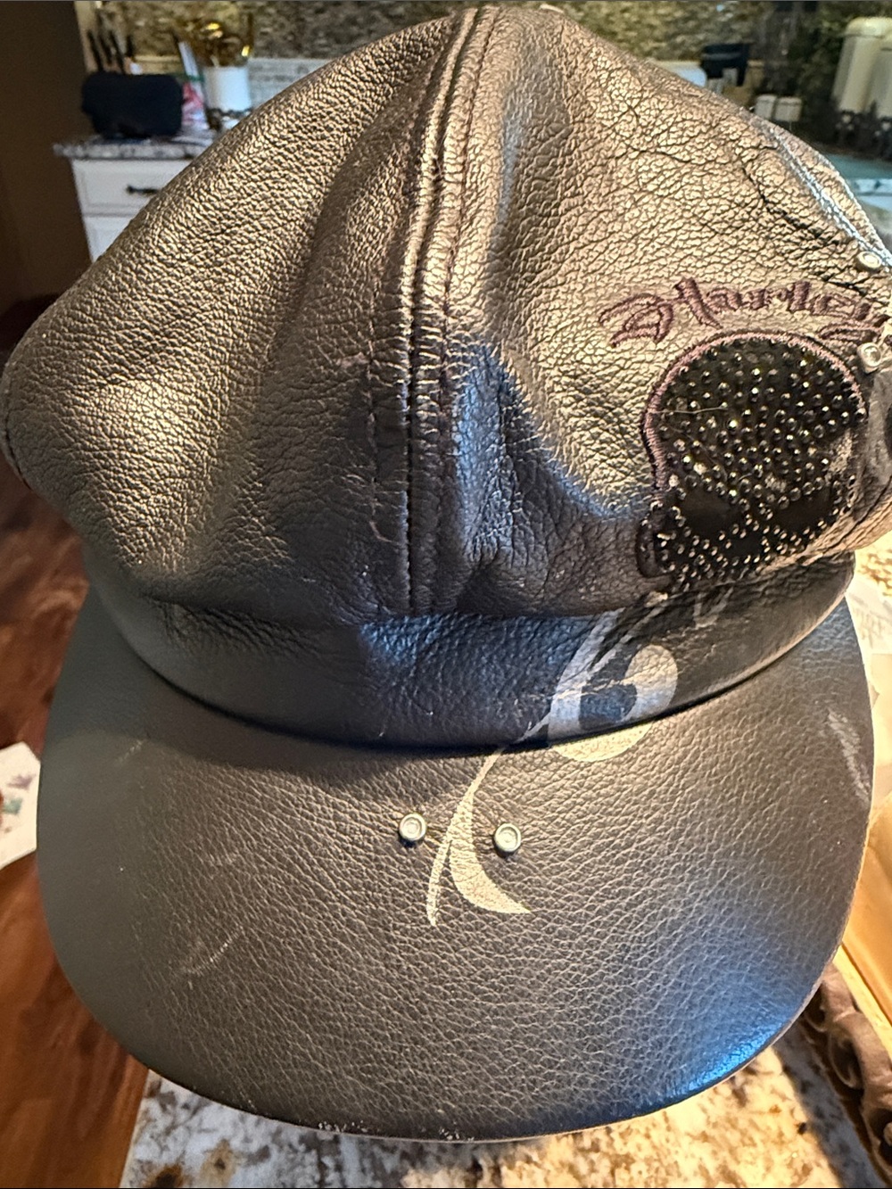 Studded Black Leather Newsboy Hat with Embroidered Detail